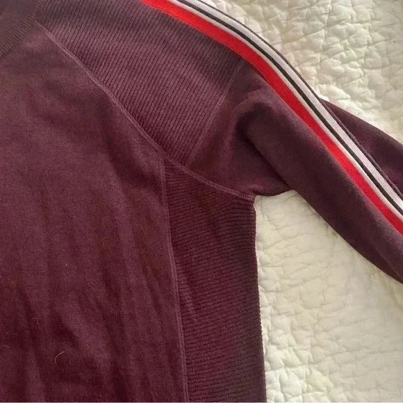 Size m Athleta Burgundy sweater with stripes on the sleeves. - Picture 6 of 6